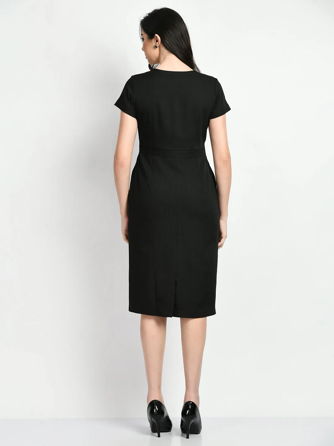 Here is an optimized version of the product title with added modifiers: Elegant Black Exude Composure Sheath Dress for Formal Occasions.