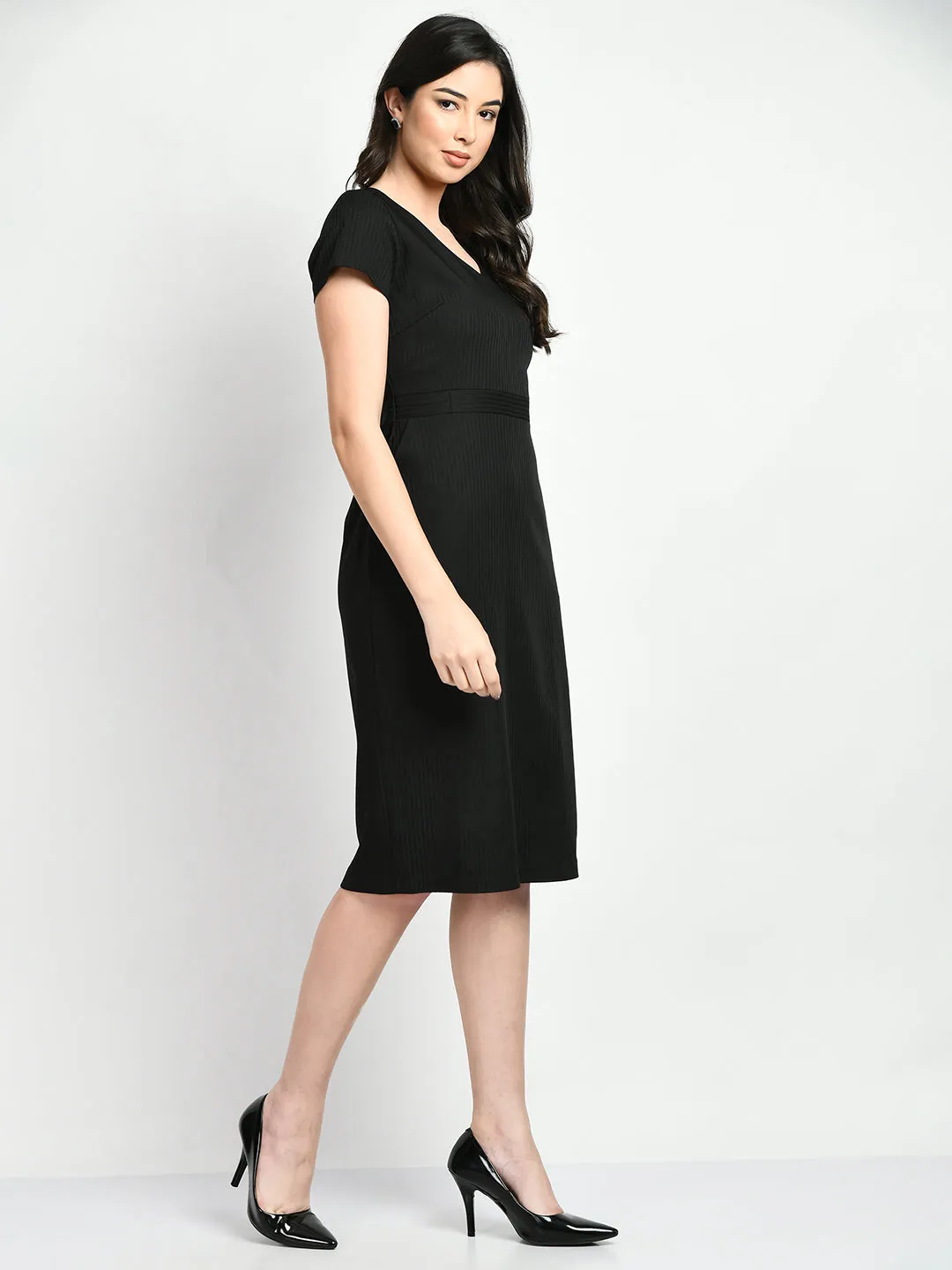 Here is an optimized version of the product title with added modifiers: Elegant Black Exude Composure Sheath Dress for Formal Occasions.