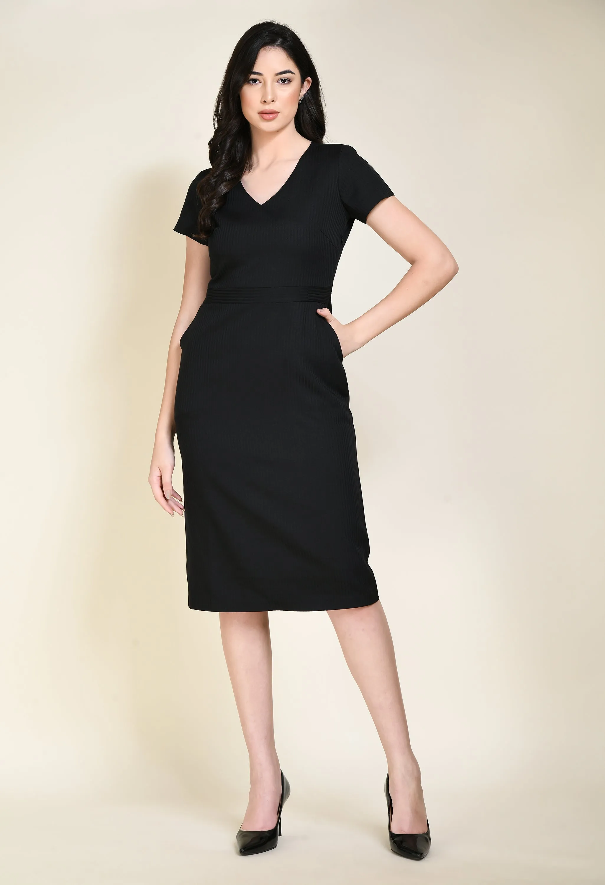 Here is an optimized version of the product title with added modifiers: Elegant Black Exude Composure Sheath Dress for Formal Occasions.