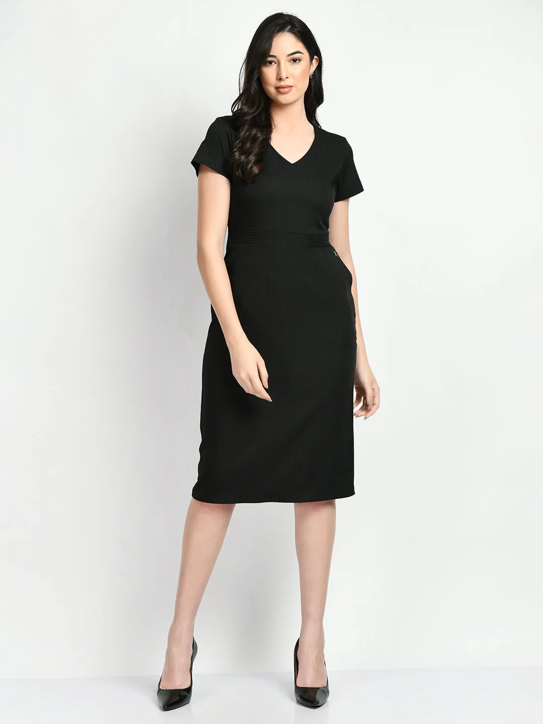 Here is an optimized version of the product title with added modifiers: Elegant Black Exude Composure Sheath Dress for Formal Occasions.